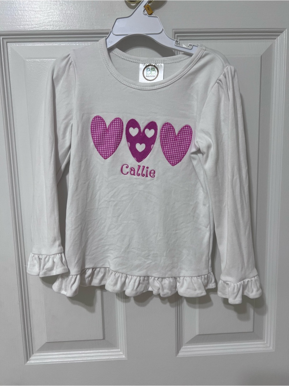 White Long-Sleeve Ruffle Top with Pink Heart Appliqués